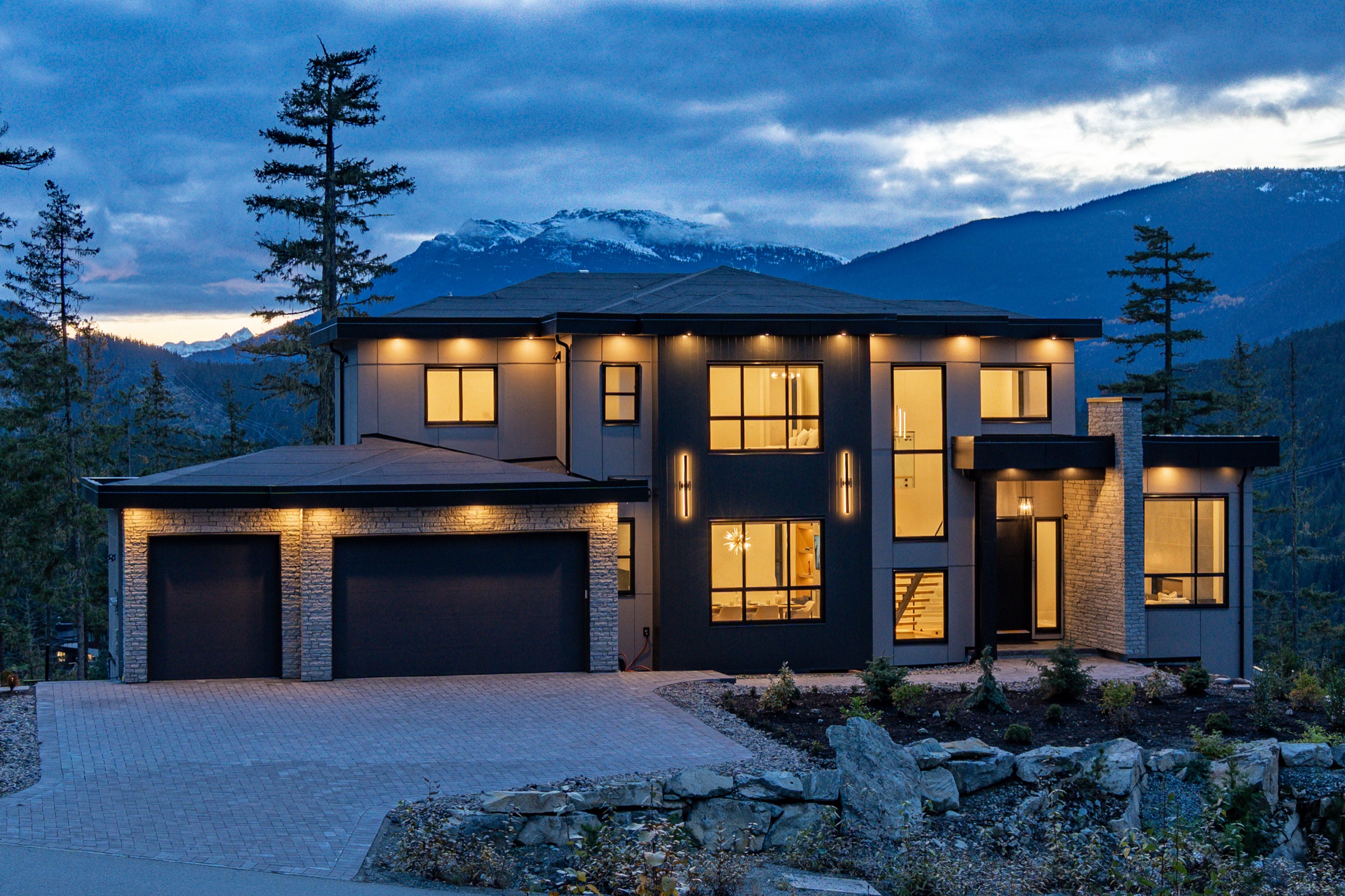 Luxury Whistler home beneath the mountains at blue hour